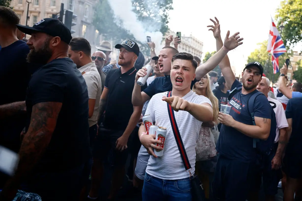 Far-right demonstrators chanted anti-migrant, anti-Muslim slogans at the London rally that turned violent on July 31.