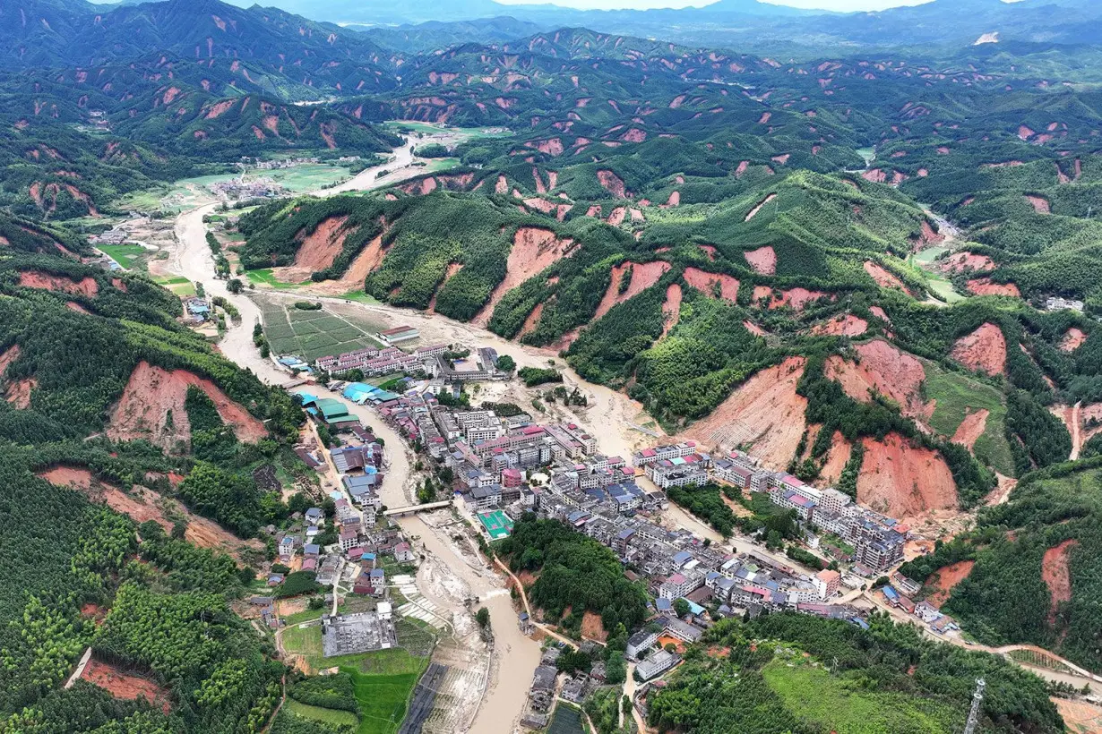 At least 30 dead after Typhoon Gaemi cut off towns in China's Hunan province