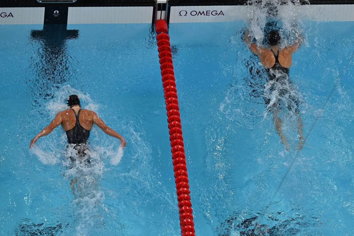 McIntosh touches the wall at the end of the 200m butterfly final.