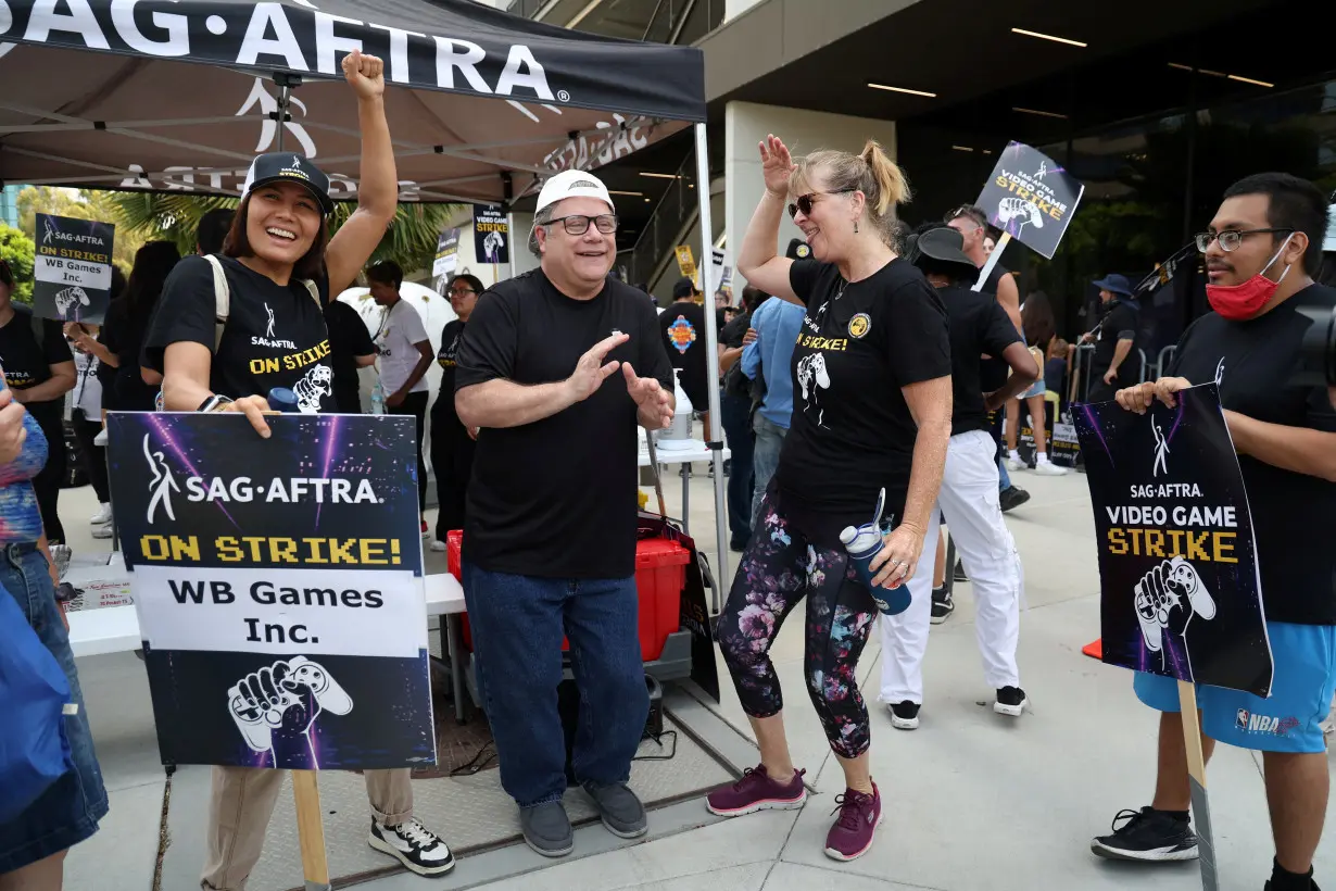 Activists and members take part in the SAG-AFTRA Video Game Strike kick-off picket outside Warner Bros. Games in Burbank