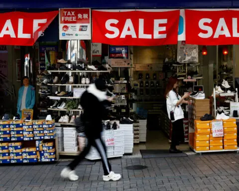Japan warns of weak yen impact on households in government white paper