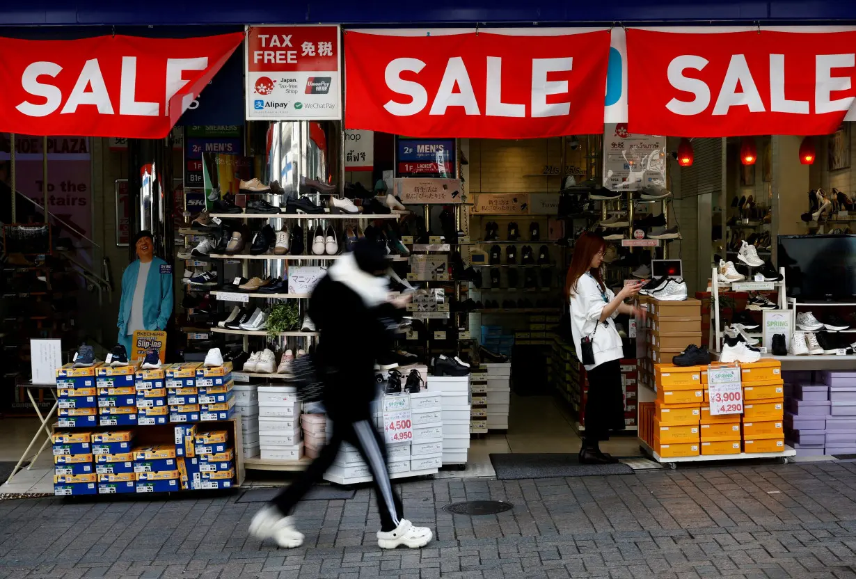 FILE PHOTO: Japan May household spending unexpectedly falls, clouds economic outlook