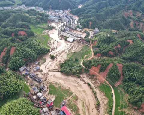 Rescuers in China race to find the missing, seal dykes after deadly floods