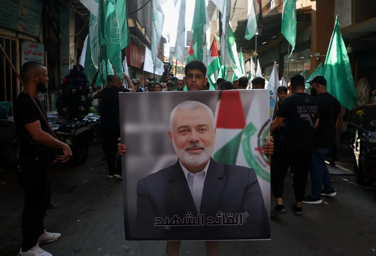 March to condemn killing of Hamas leader Haniyeh, at refugee camp in Beirut