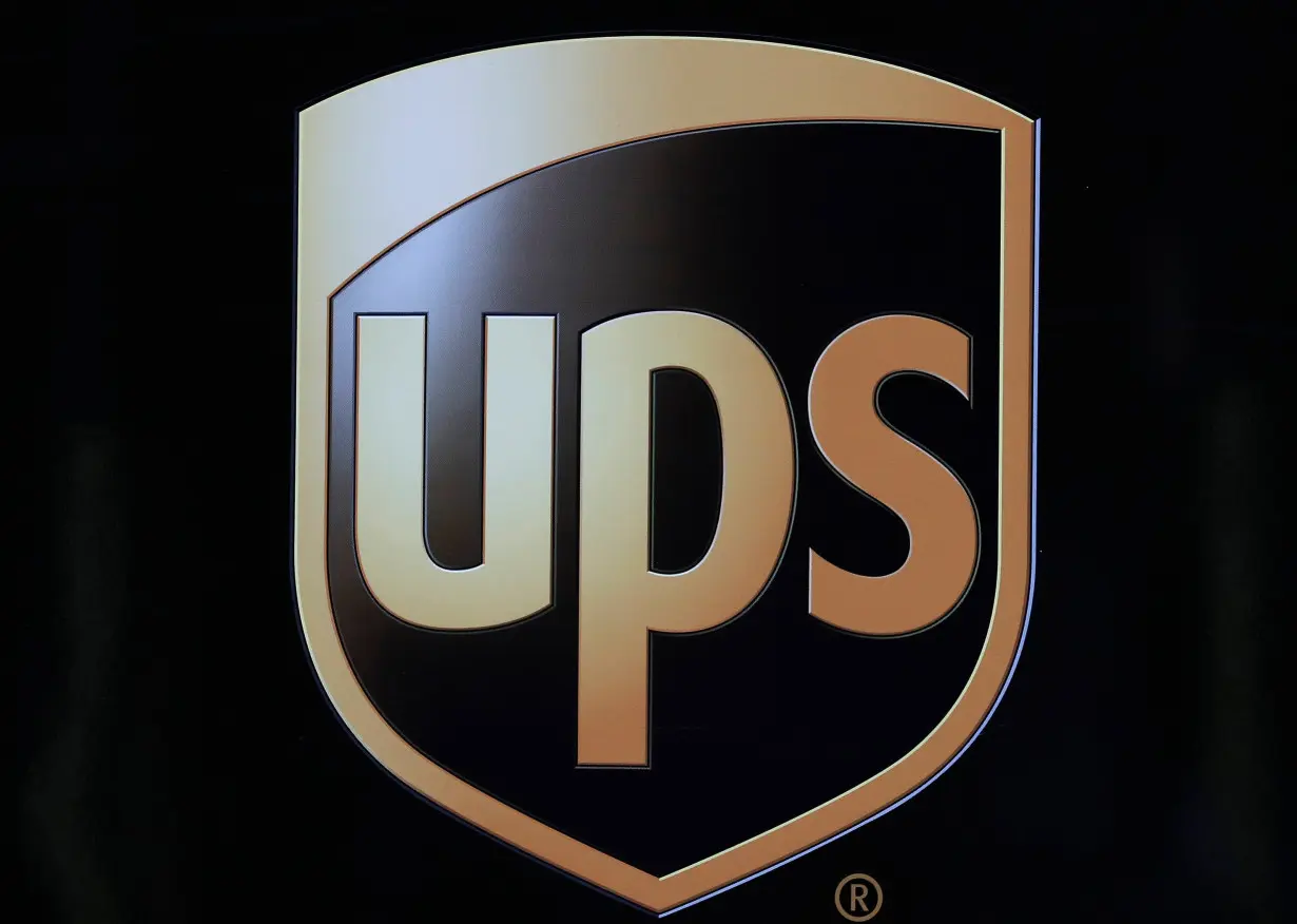 A UPS logo is seen on the side of a delivery van in Manchester northern England.