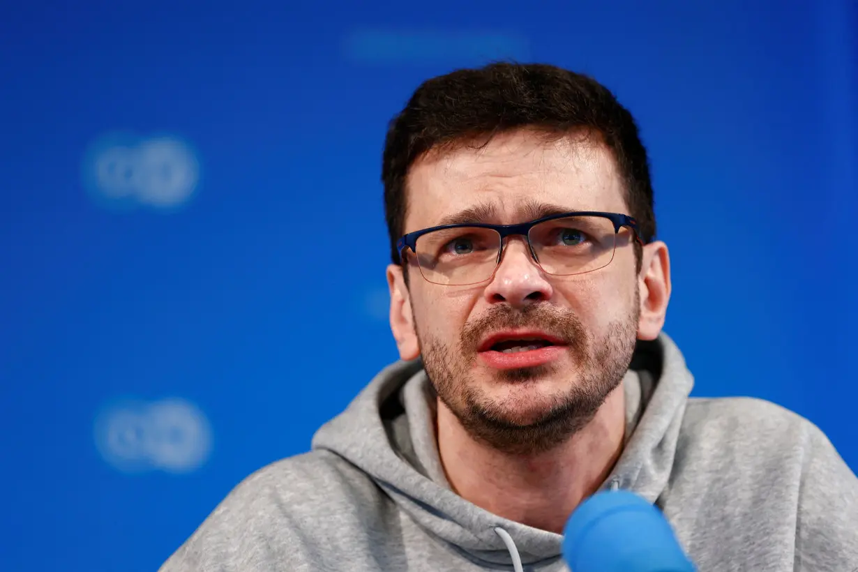 Russian dissidents Ilya Yashin, Vladimir Kara-Murza and Andrei Pivovarov hold a press conference after being freed, in Bonn