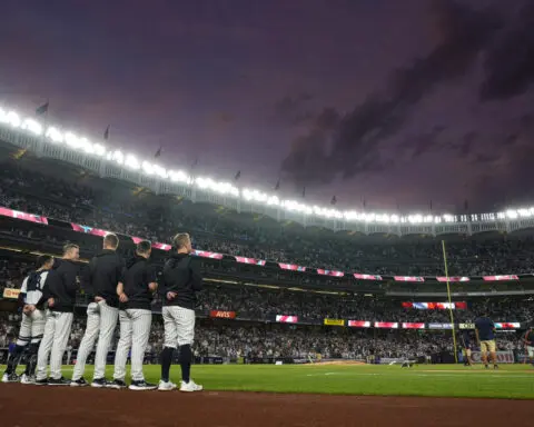 Some Yankee Stadium bleachers fans chant `U-S-A!' during `O Canada' before game against Blue Jays