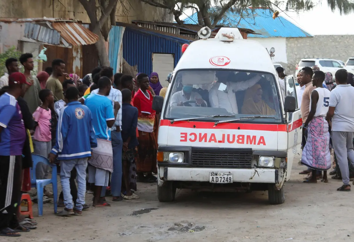 At least 32 killed after suicide bombers target beach restaurant in Somali capital