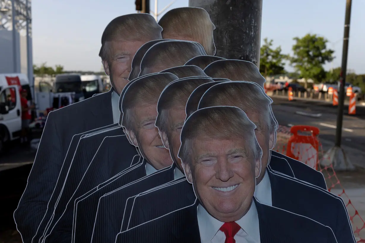 Cut-outs of Republican presidential candidate and former U.S. President Donald Trump are placed at a stall of a street vendor in Atlanta