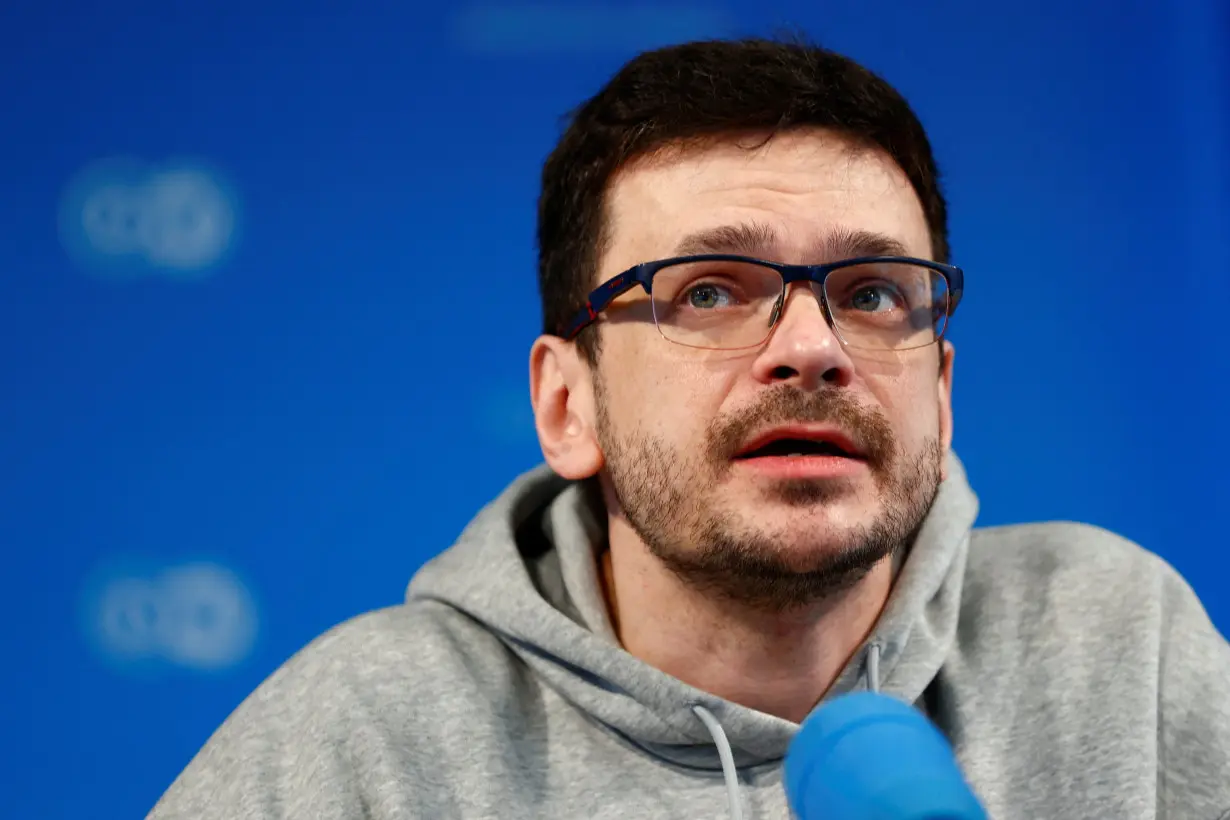 Russian dissidents Ilya Yashin, Vladimir Kara-Murza and Andrei Pivovarov hold a press conference after being freed, in Bonn