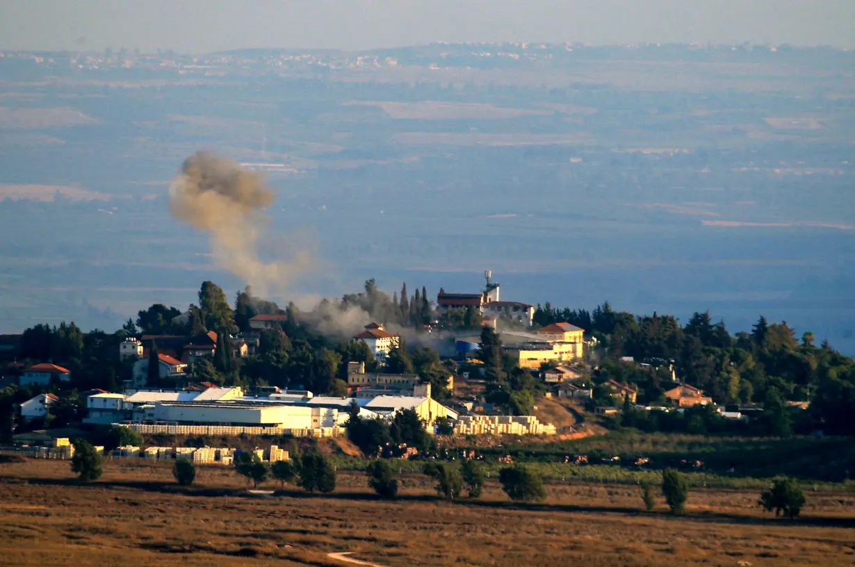 Smoke billows at the Israeli-Lebanon border from the site of a rocket fired from the Lebanese side, towards the Israeli village of Metullah on Saturday.