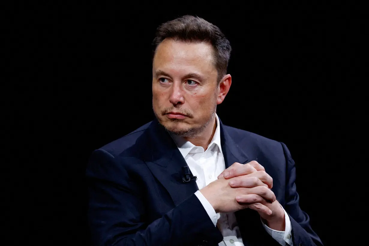 FILE PHOTO: FILE PHOTO: Tesla CEO and X owner Elon Musk attends the VivaTech conference in Paris