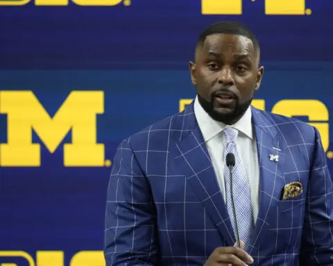 Michigan's Moore faces allegations of NCAA violations in sign-stealing investigation, AP sources say