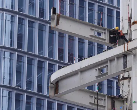 China's services activity expands further, but external demand slows, Caixin PMI shows