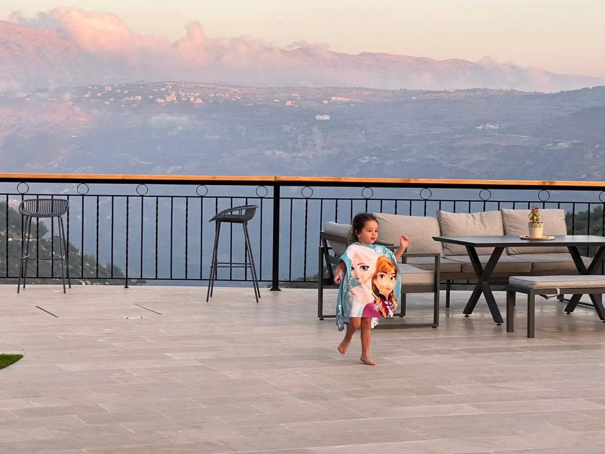 Katya at a cabin in the Lebanese mountains on August 2. The next day, the hills shook with the sound of sonic booms as Israeli war planes broke the sound barrier overhead.