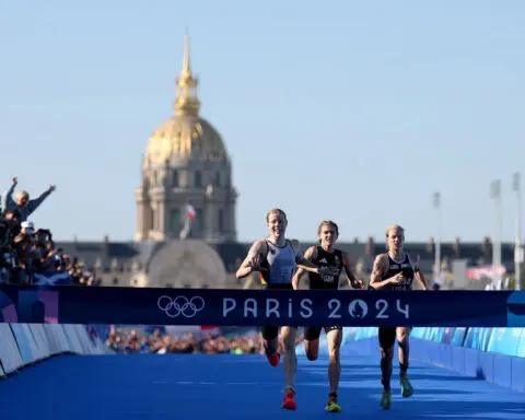 Germany wins dramatic gold medal after controversial mixed relay triathlon went ahead in River Seine