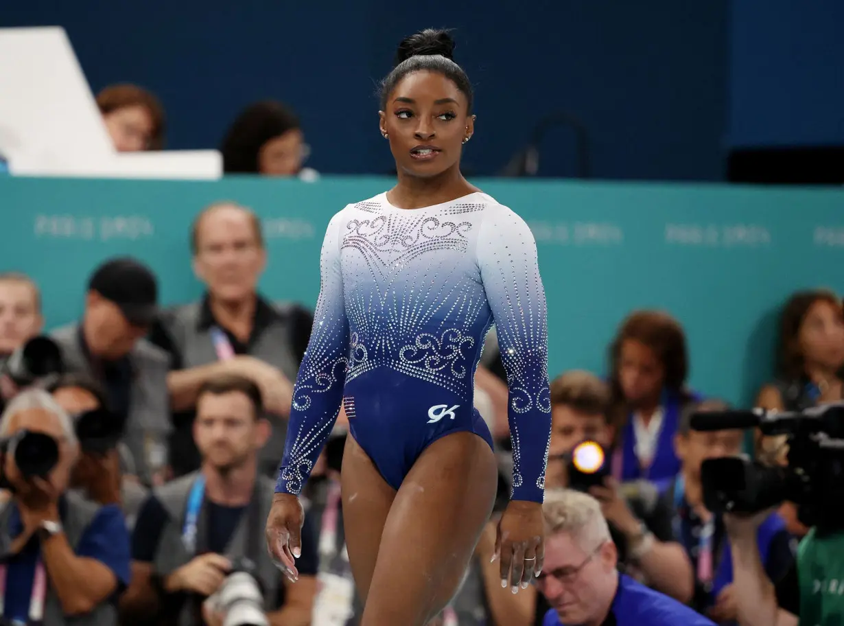 Simone Biles slips off the balance beam and fails to win gold for the first time in Paris