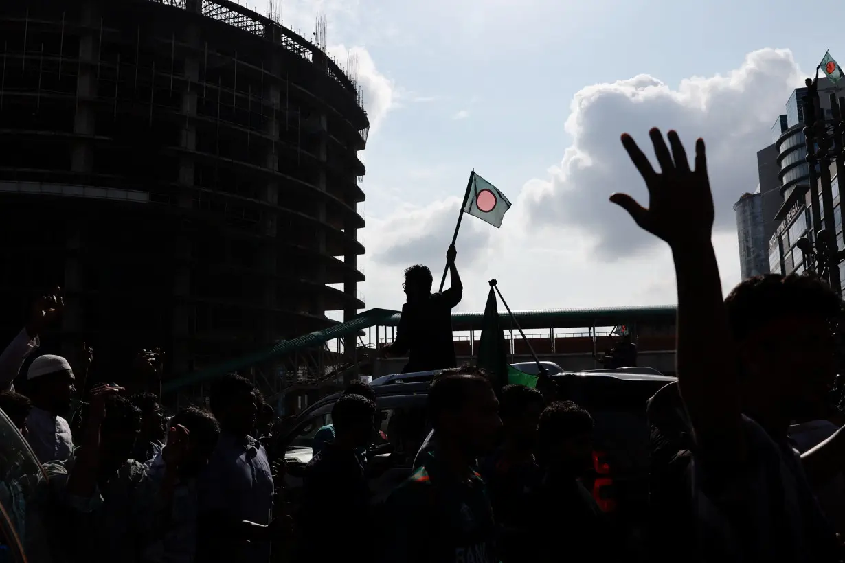 People celebrate the resignation of Bangladeshi Prime Minister Hasina in Dhaka