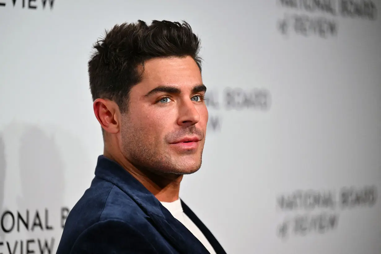 Zac Efron says he's 'happy and healthy' following reports of brief hospitalization