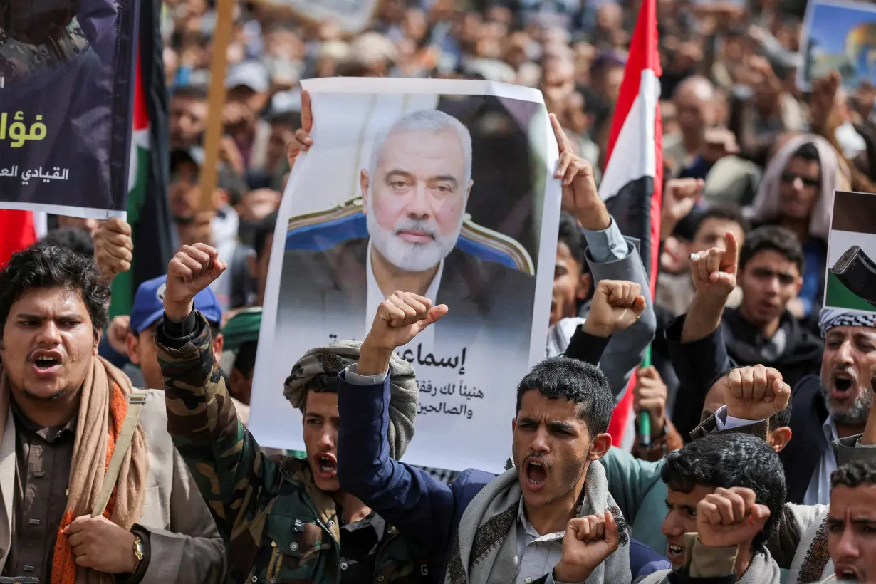 FILE PHOTO: Protesters demonstrate in solidarity with Palestinian prisoners outside UN offices in Sanaa