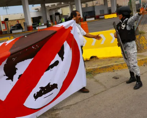 Trump says Venezuela is being run by a dictator