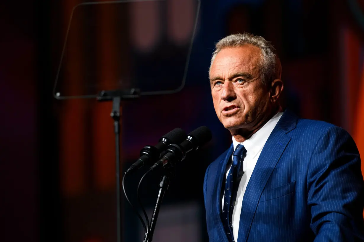 New Yorker publishes photo of RFK Jr. with dead bear cub. He joked it may be where he got his brain worm