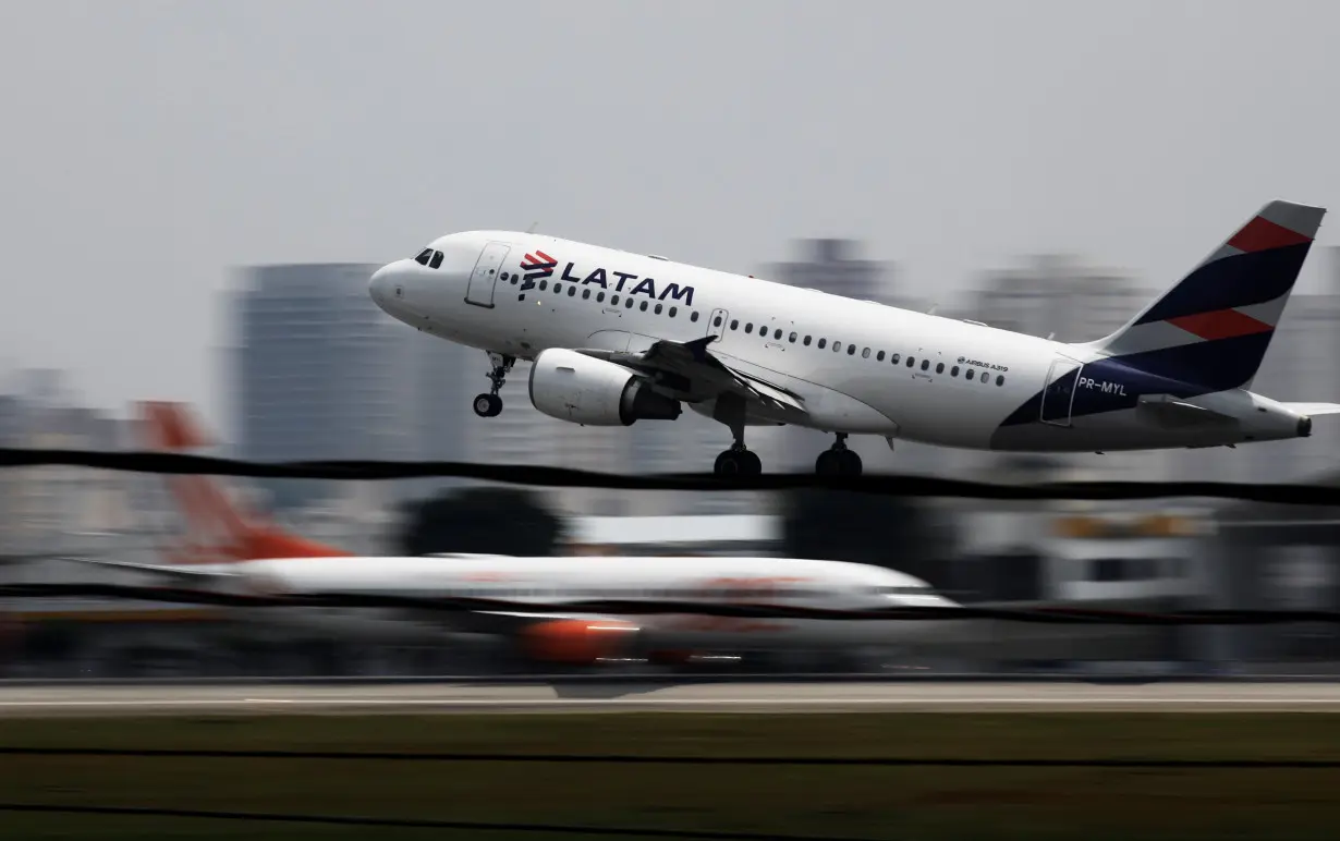 A LATAM Airlines Brasil Airbus A319 plane takes off from Congonhas airport in Sao Paulo, Brazil