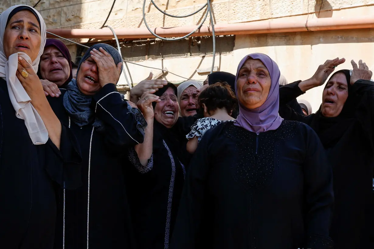 Funeral of three Palestinians who were killed in an Israeli raid, in Aqaba