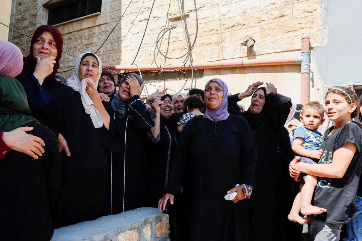 Funeral of three Palestinians who were killed in an Israeli raid, in Aqaba