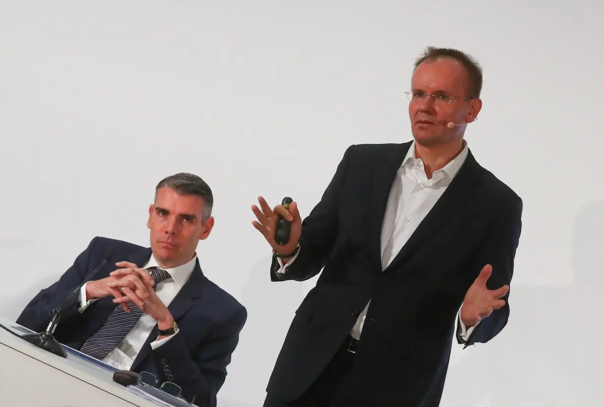 Braun and von Knoop of Wirecard AG attend the company's annual news conference in Aschheim