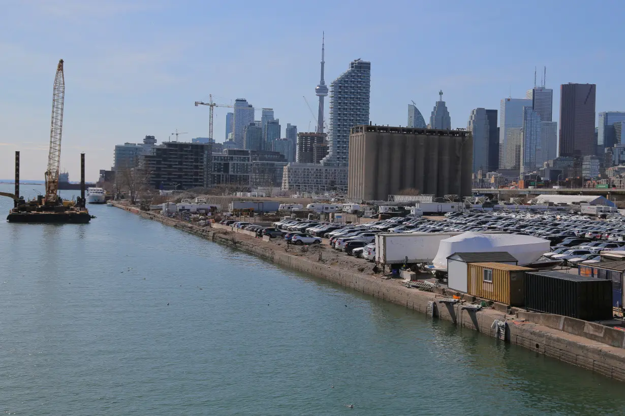 The downtown skyline and CN Tower are seen past the eastern waterfront area of Toronto