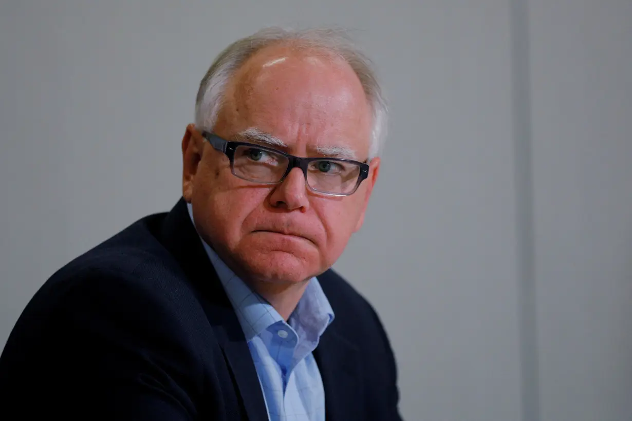 FILE PHOTO: Democratic candidate for Governor Tim Walz participates in a gun violence prevention roundtable with former Representative Gabby Giffords in Minneapolis