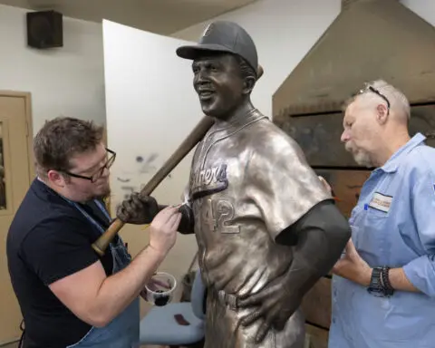 New Jackie Robinson statue to replace stolen one gets all-star dedication at Kansas youth baseball field