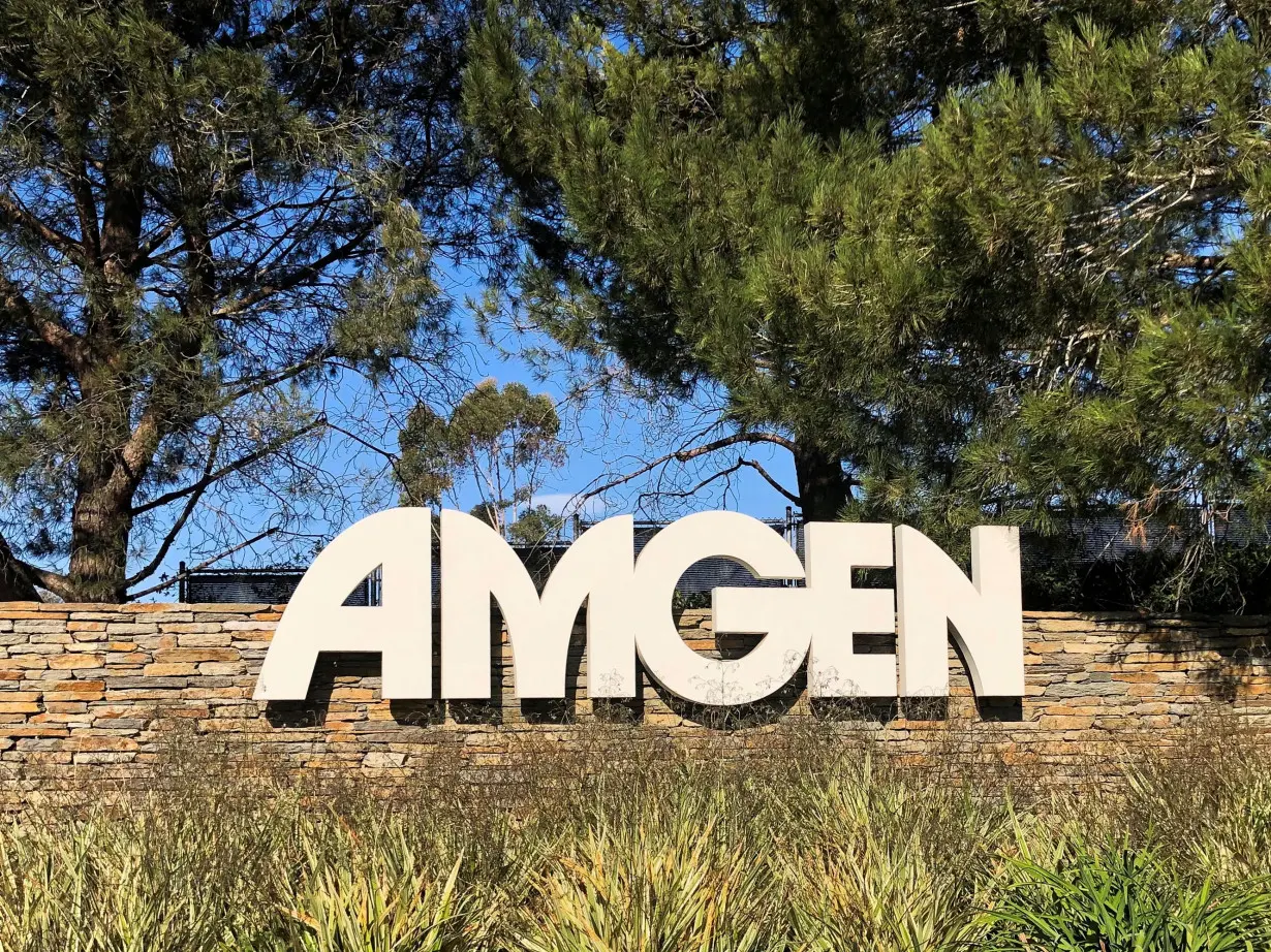 FILE PHOTO: An Amgen sign is seen at the company's headquarters in Thousand Oaks