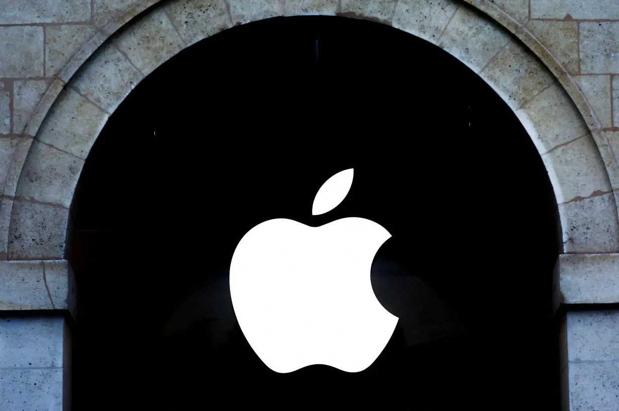 FILE PHOTO: Apple logo at an Apple store in Paris