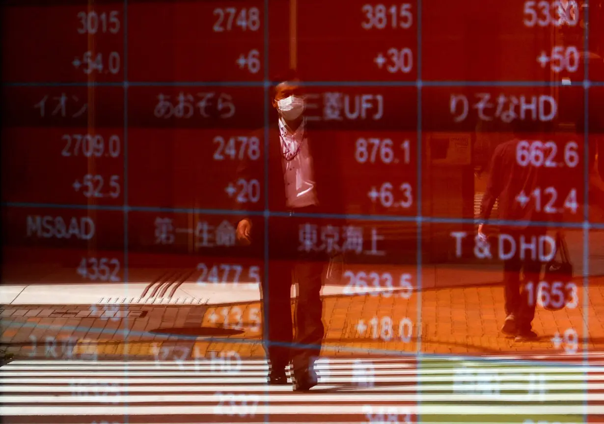 FILE PHOTO: Japan's Nikkei plunges to 7-month low as yen rallies