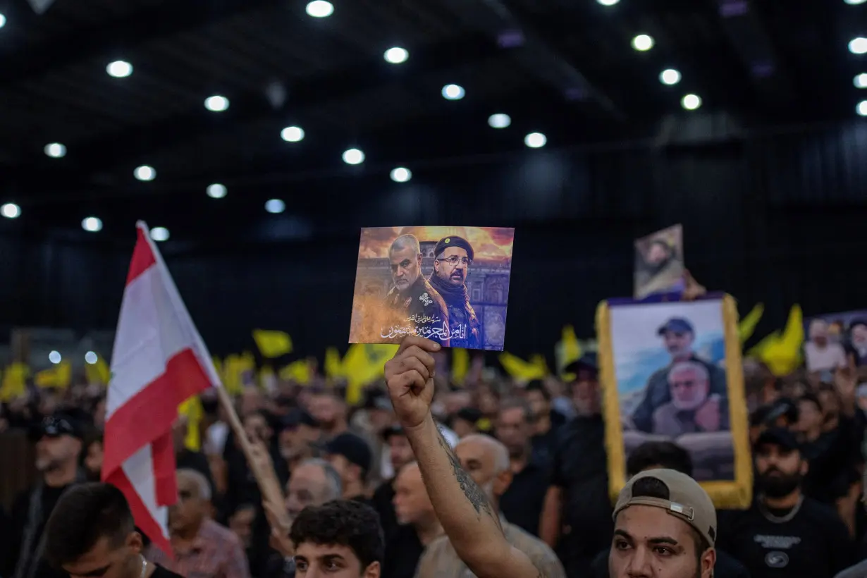 Supporters listen to the speech of Hezbollah leader Nasrallah in Beirut