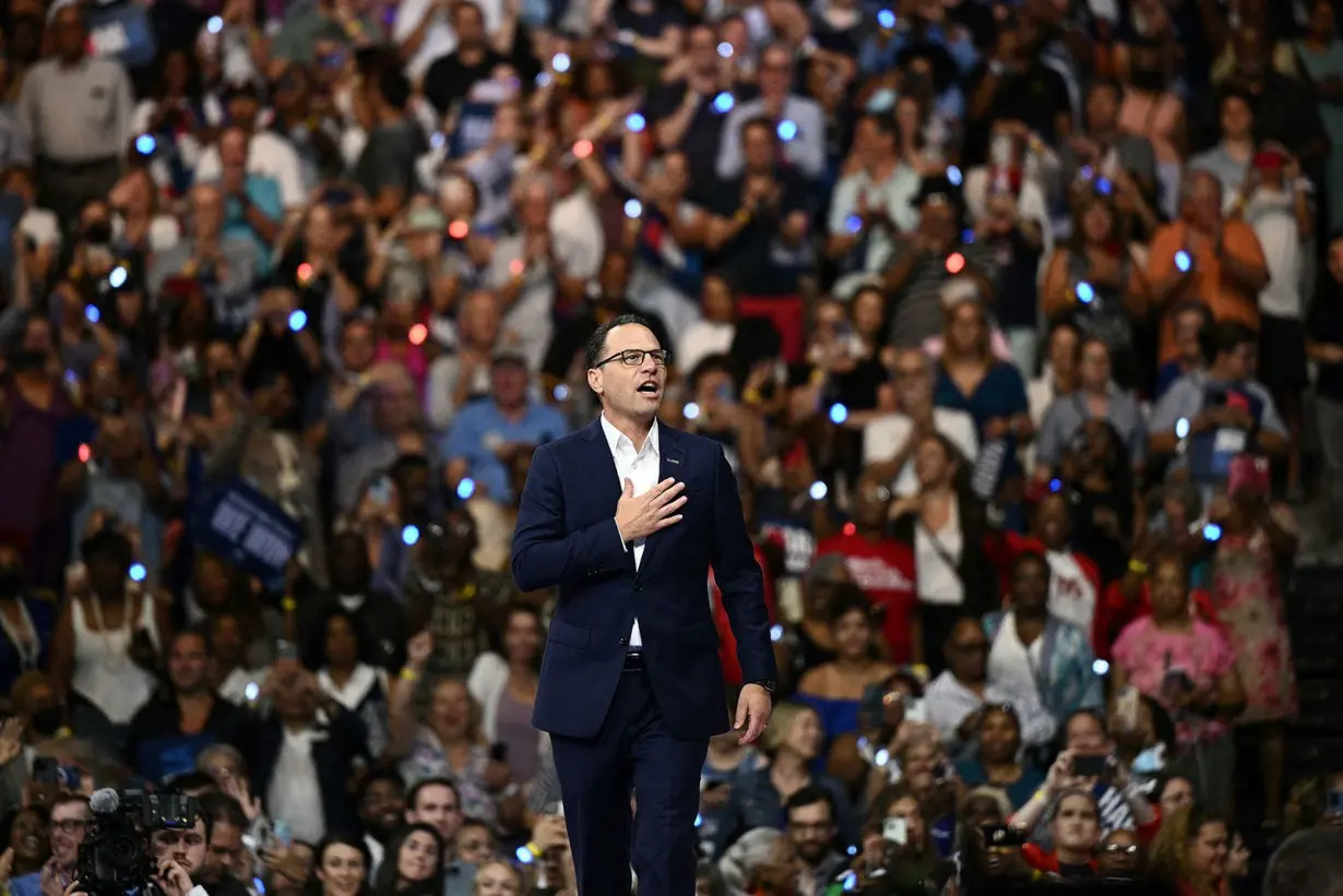 Pennsylvania Governor Josh Shapiro arrives at Temple University's Liacouras Center in Philadelphia, Pennsylvania, on August 6.