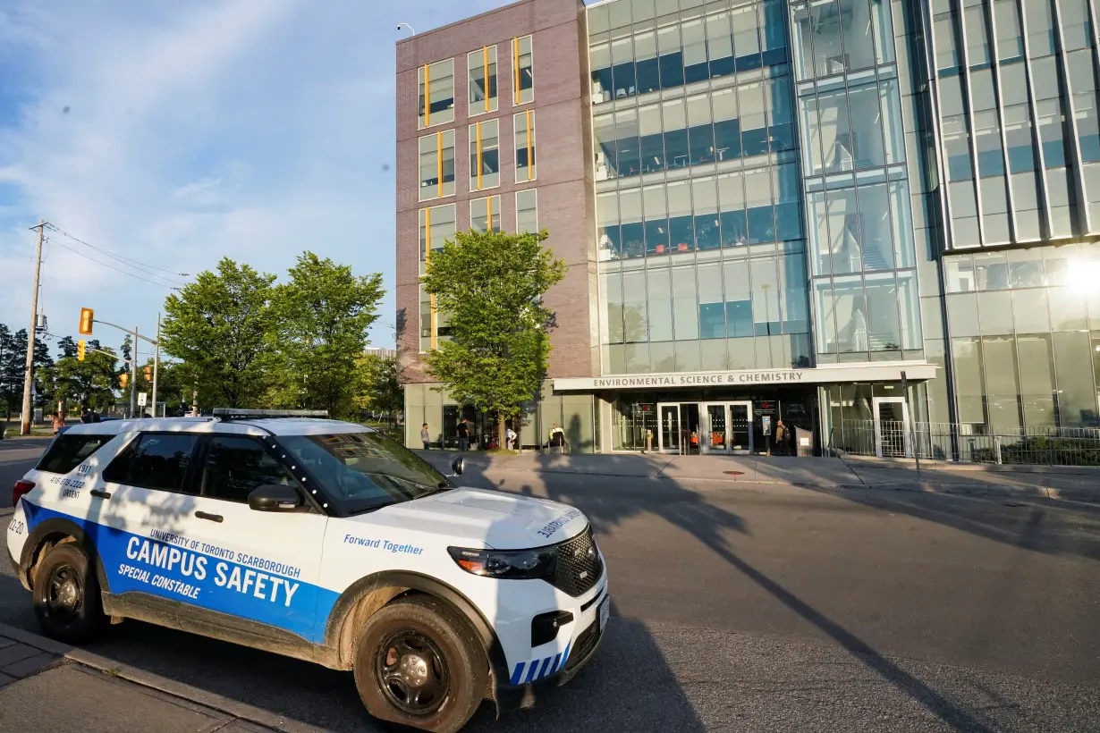 A police vehicle is parked outside of the University of Toronto's Scarborough Campus after police say during a press conference that they detonated a hoax explosive device, in Toronto