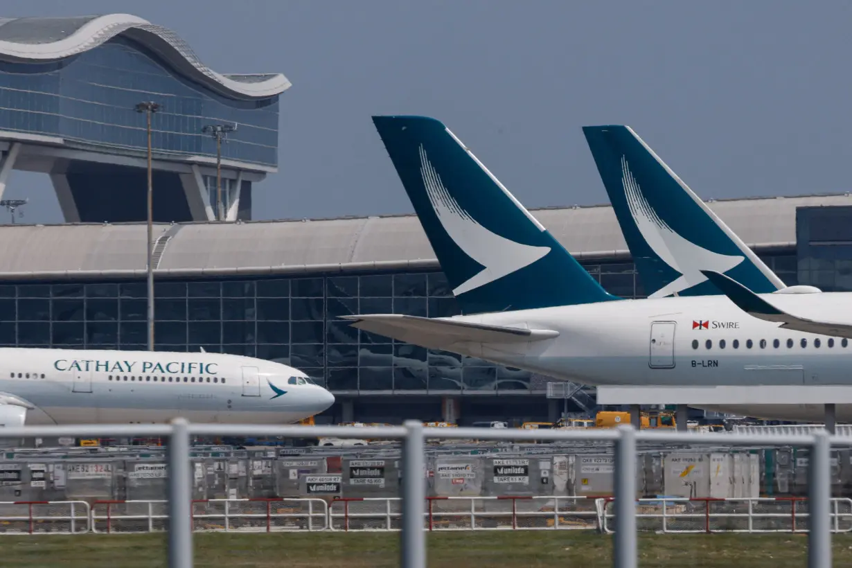 Cathay Pacific aircraft are seen parked at Hong Kong International Airport in Hong Kong