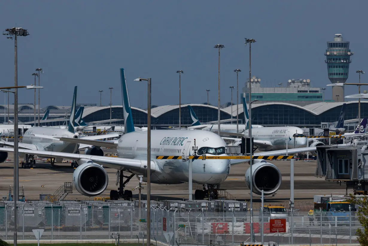 Cathay Pacific aircraft are seen parked at Hong Kong International Airport in Hong Kong