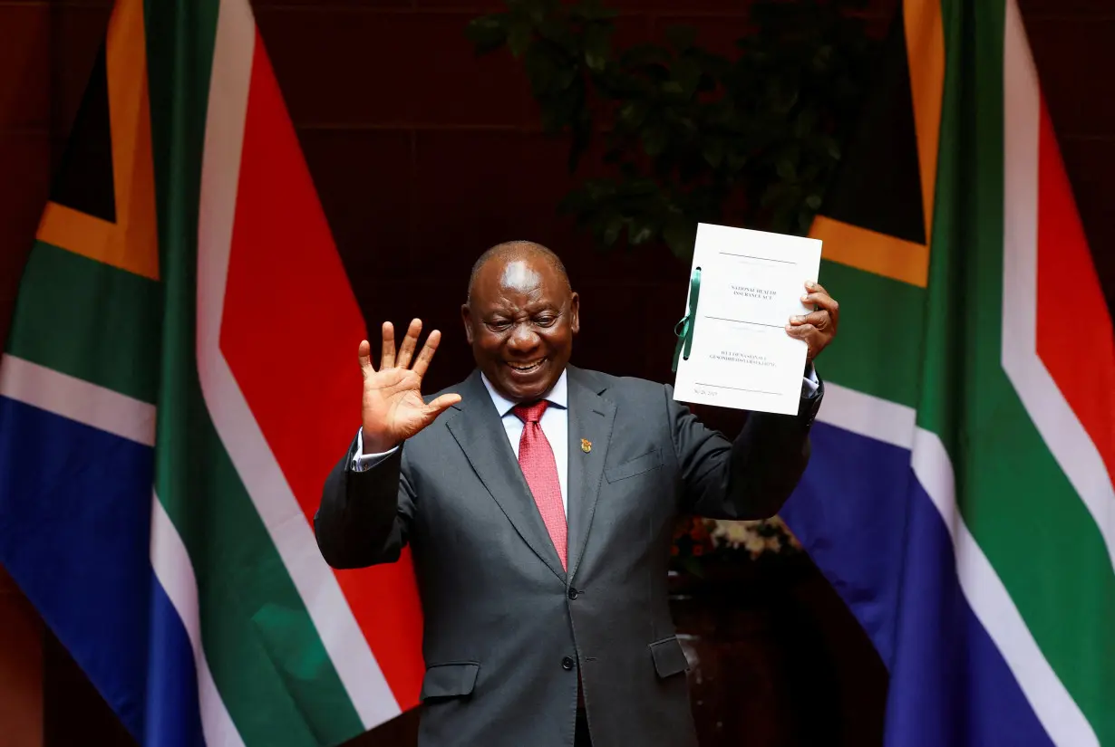 South Africa's Ramaphosa to signs health insurance bill into law