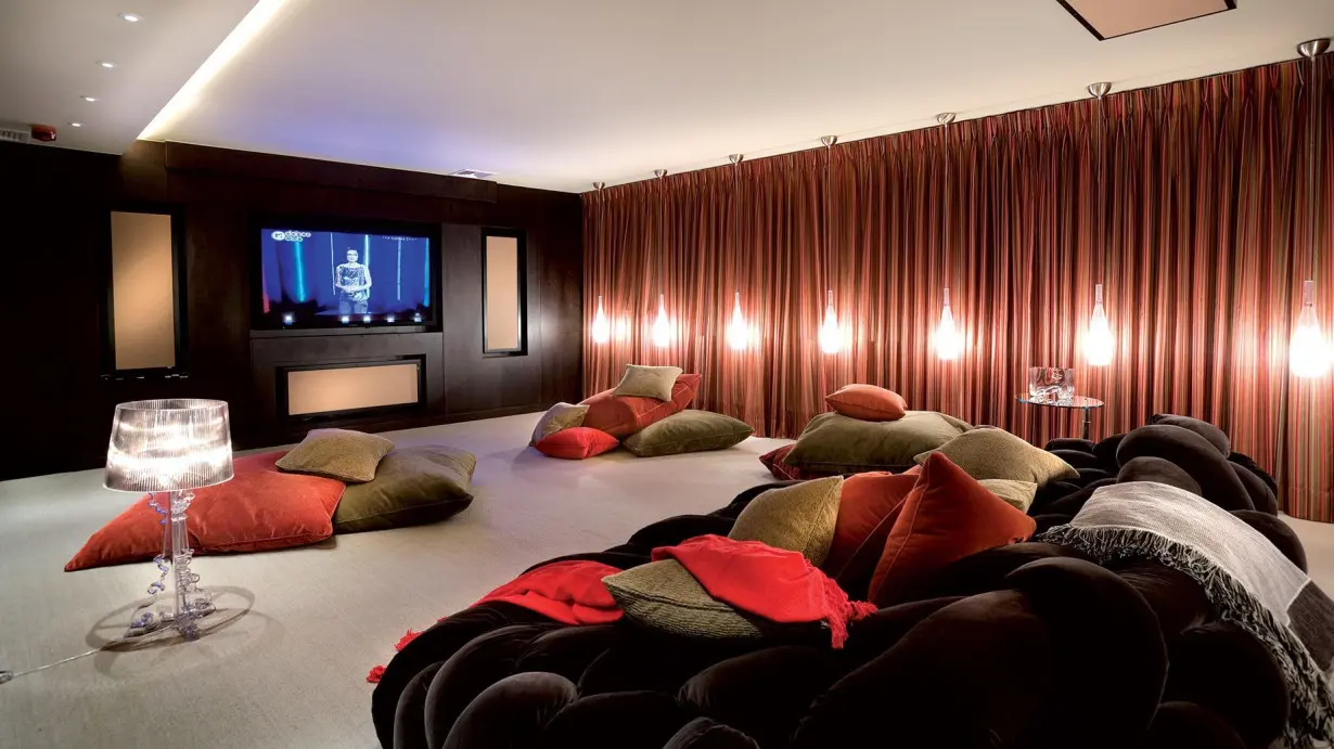 SHH, one of the world's leading high net worth design studios, designed this London house with a cinema room complete with a reinforced door system to help residents 