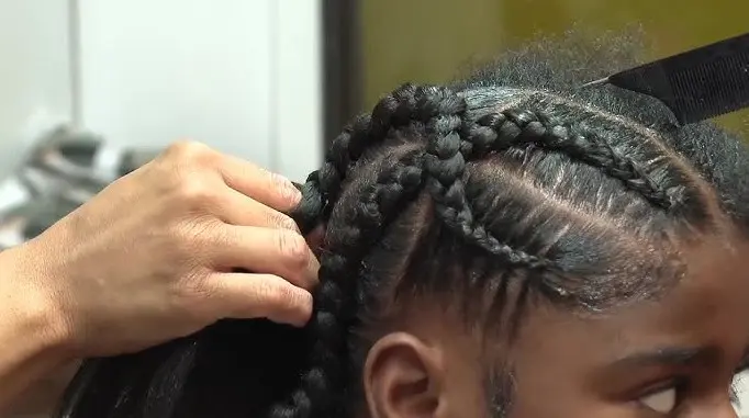 Barber shop offers free back-to-school haircuts & braids