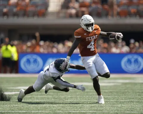 Texas running back CJ Baxter lost for season with training camp knee injury that requires surgery