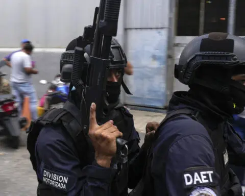 An aid worker's airport disappearance stirs fear of repression following disputed Venezuela election