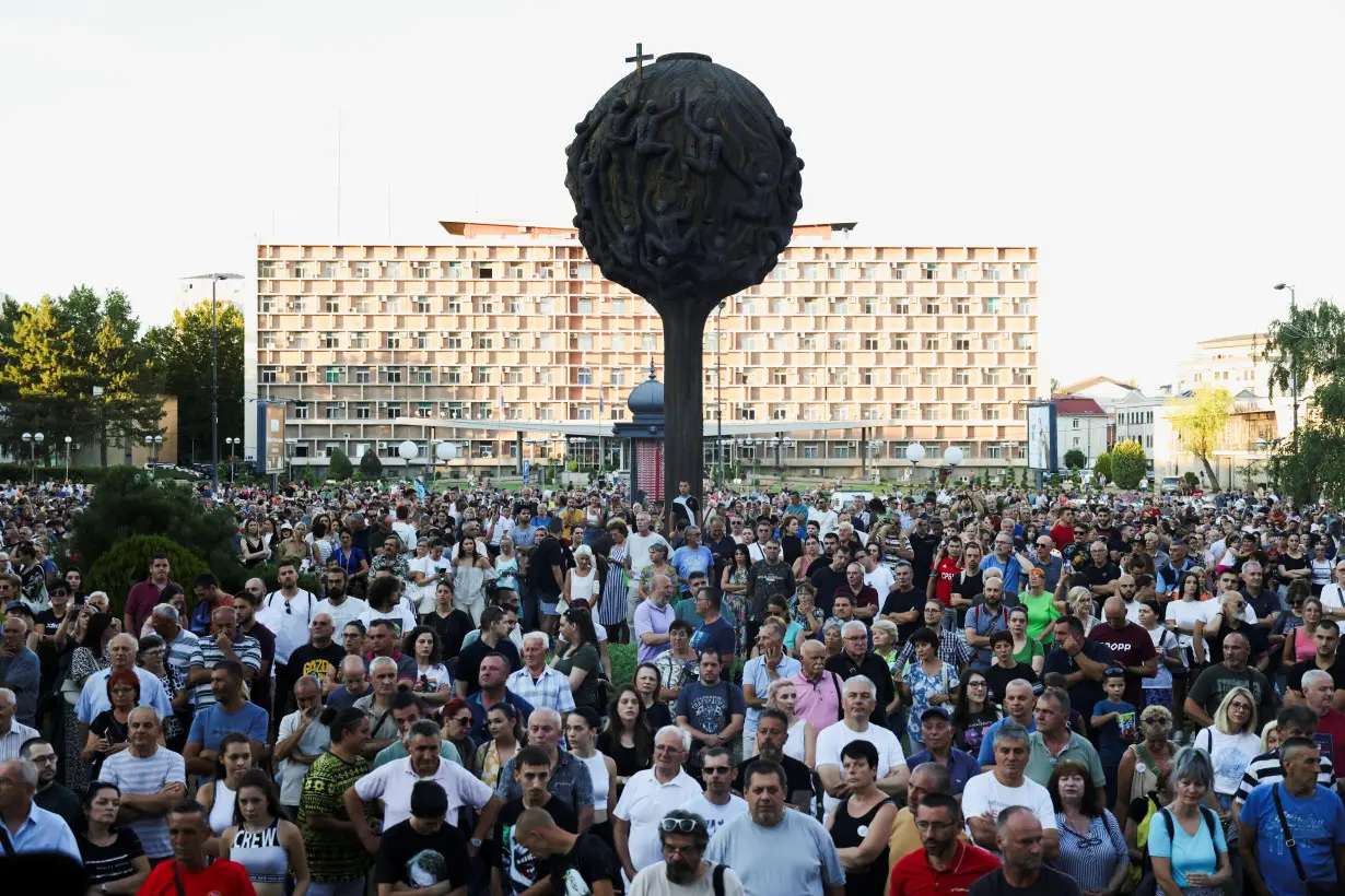 People attend a protest against Rio Tinto's opening lithium mine