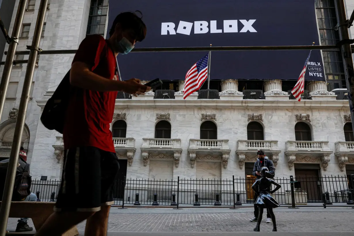 The Roblox logo is displayed on a banner at the NYSE in New York