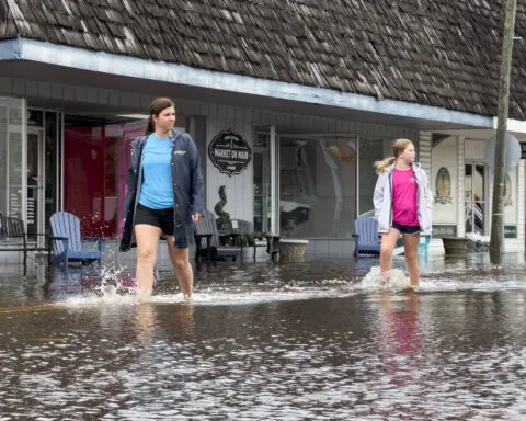 The Latest: Debby moves inland as the tropical depression soaks the Carolinas