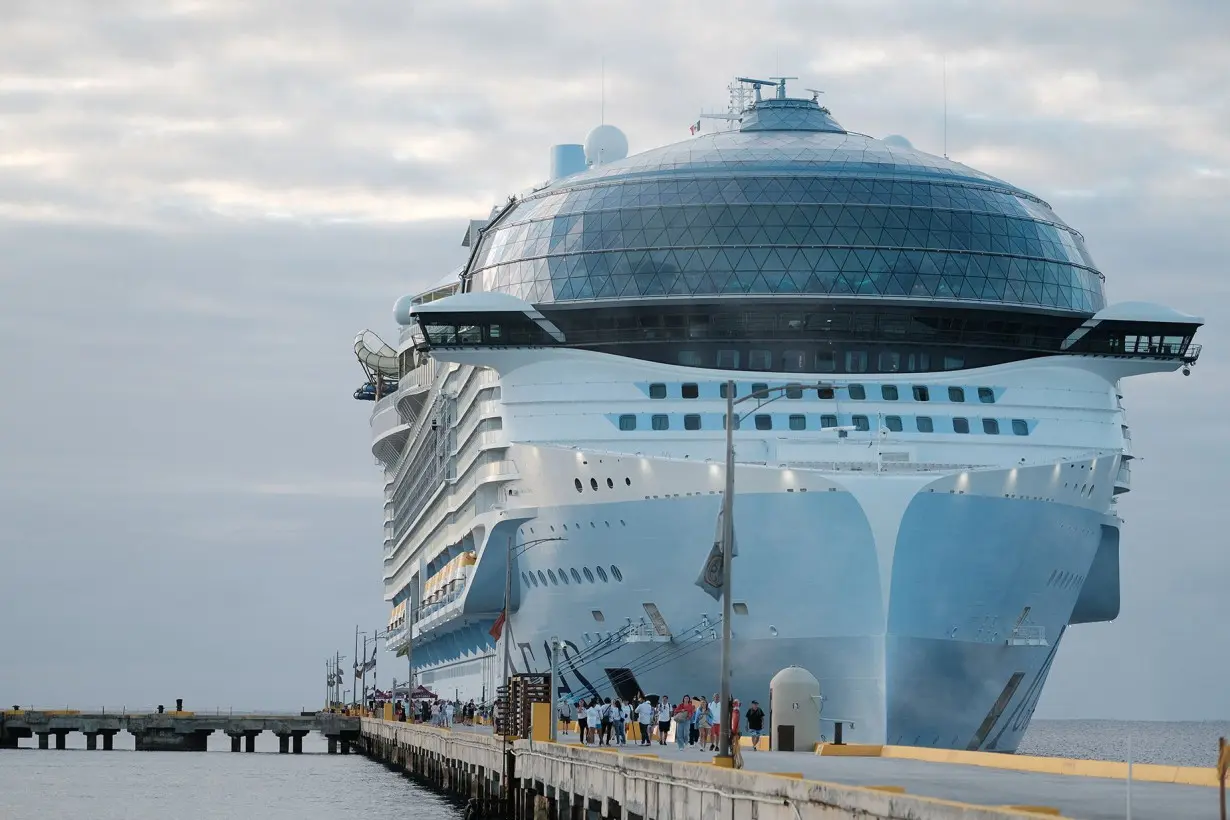 Passengers leave Royal Caribbean's Icon of the Seas, the largest cruise ship in the world, after arriving at Costa Maya Cruise Port on February 6, 2024.